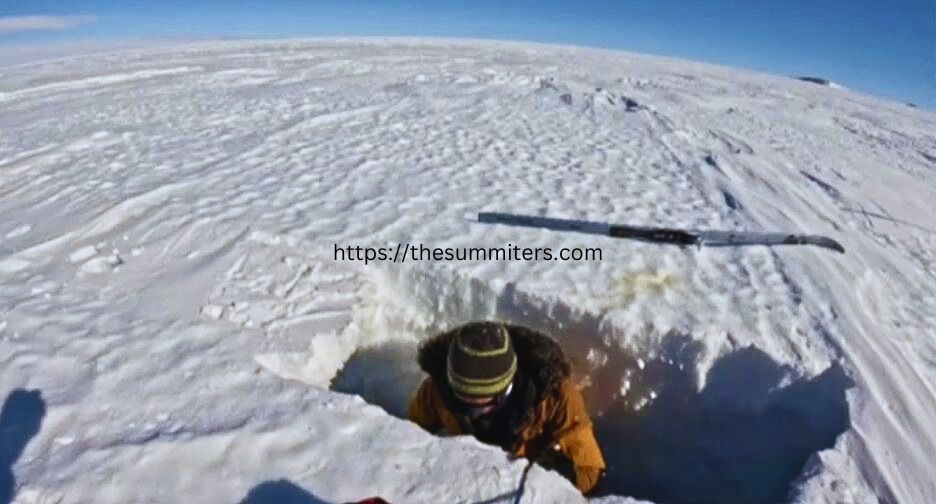 A rescue worker extracts O’Brady’s ski and pole from the crevasse. Photo: Colin O’Brady

