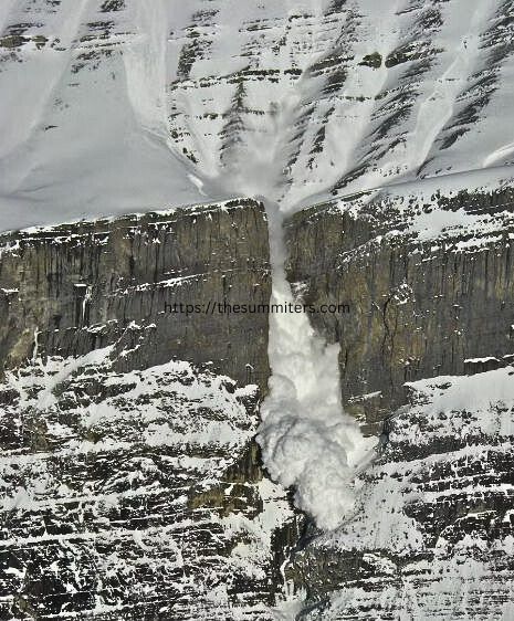 Avalanche down the waterfall on Polar Circus. Photo: Max Darrah

