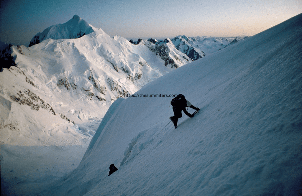 A Climber ascending to summit Point - Alpine Ice Hack