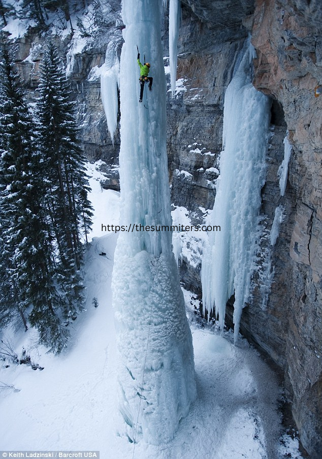 A climber, climbing Vertical - Steep Ice Climbing