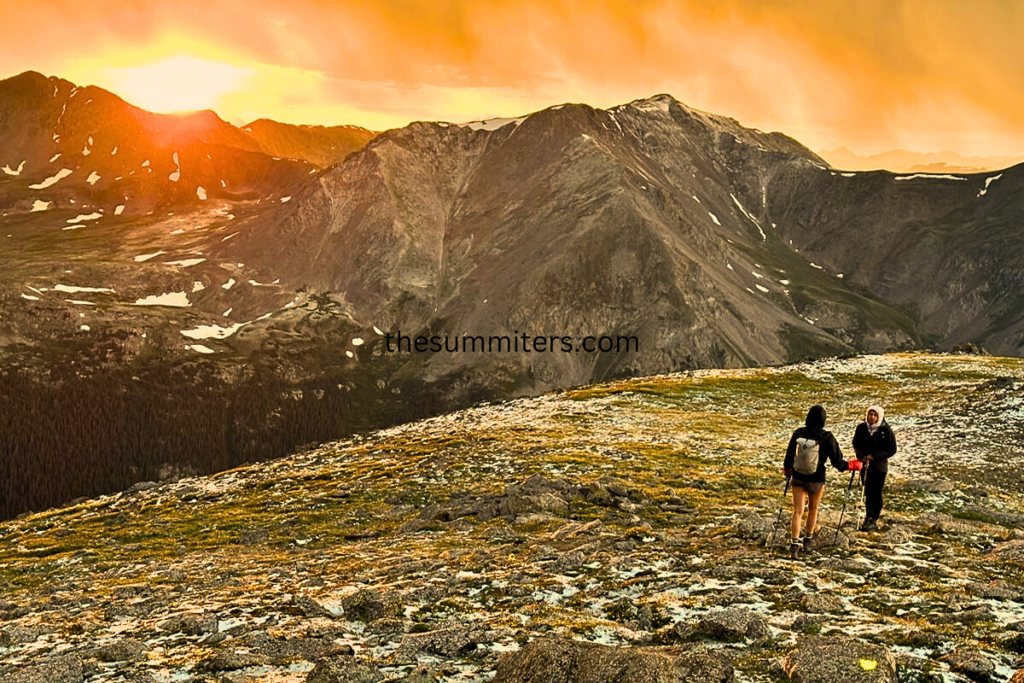 Descending off of Mount Harvard under a stormy sunset.