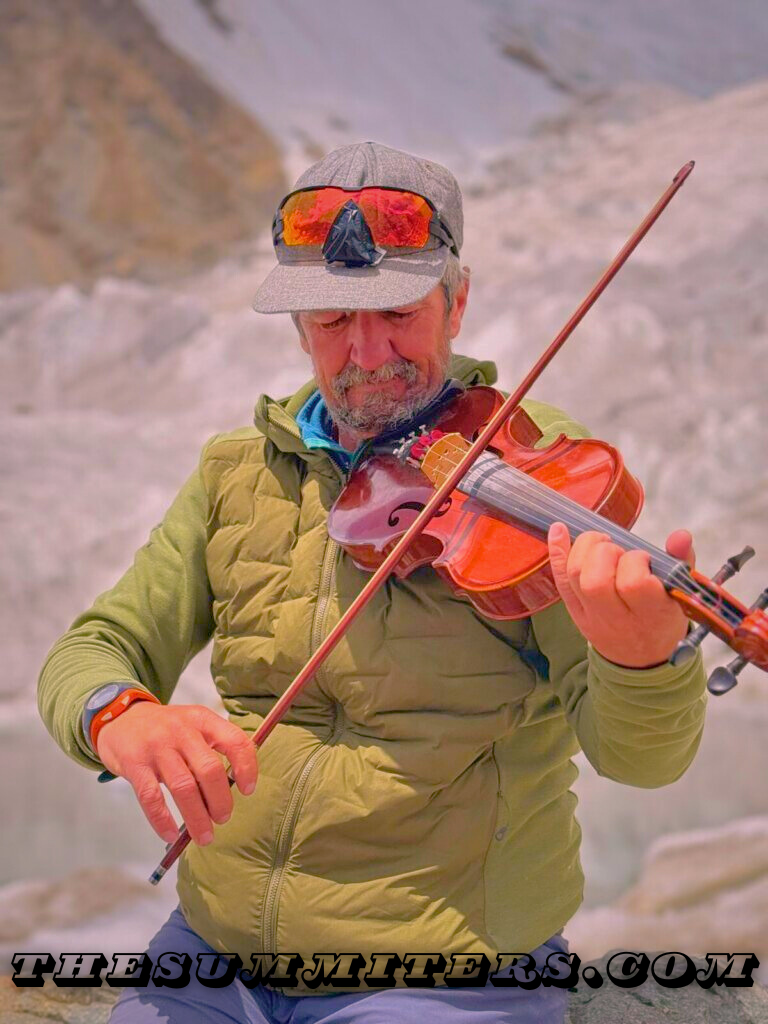 Fredriksen plays the violin at K2 Base Camp. Photo: Jean Yves Fredriksen

