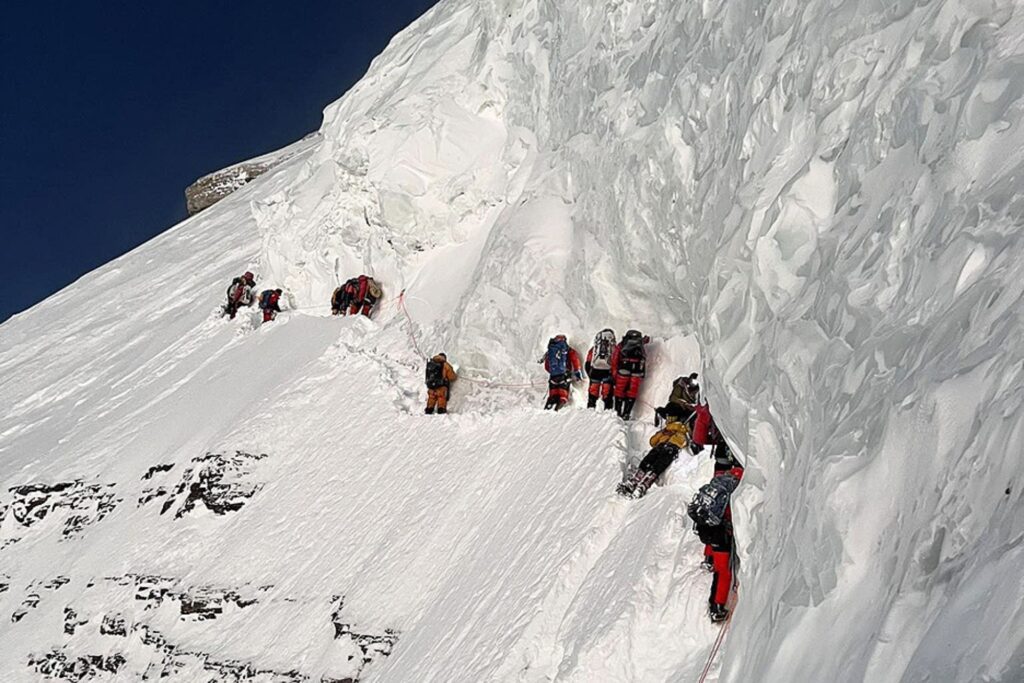 Climbers Navigating the K2 Bottleneck